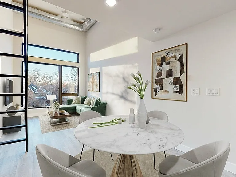 Open Concept Dining Area with Loft Space Overlook