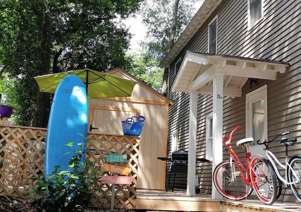 Deck with outside shower, grill, and shed