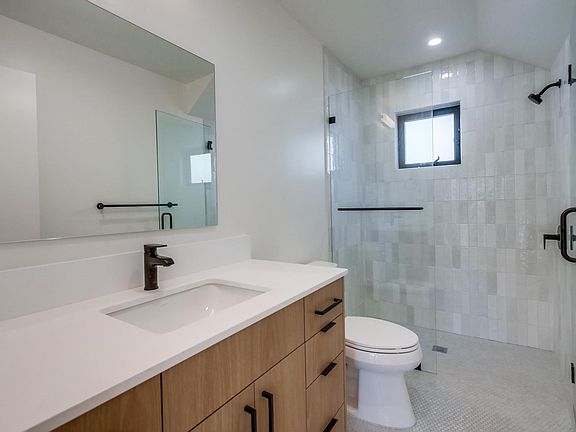 Ground floor Bedroom #3 private full bathroom.