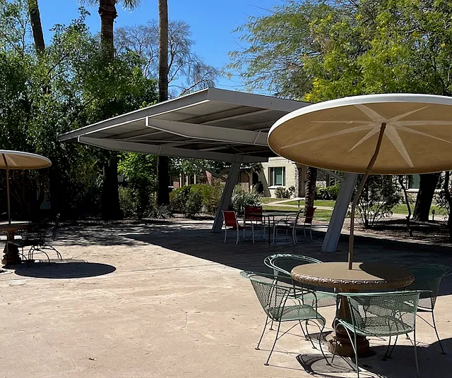 Eastwood Townhomes Community Common Area Large Shaded Patio located adjacent to Gated Community Large Swimming Pool.