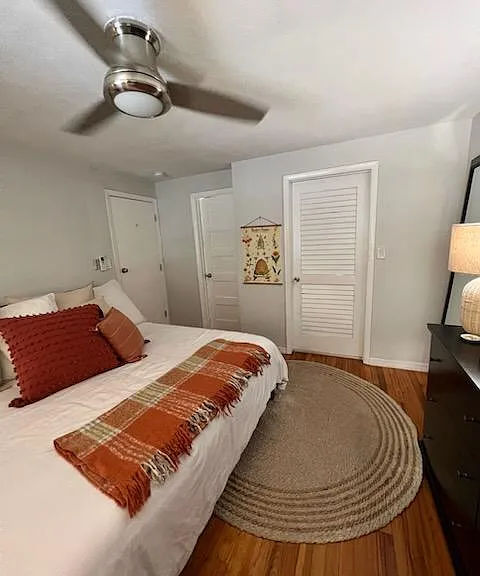 bedroom showing closet and bathroom entry