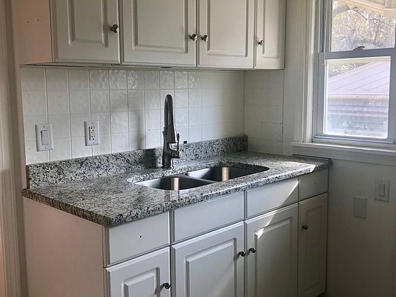 Kitchen--All white and gray