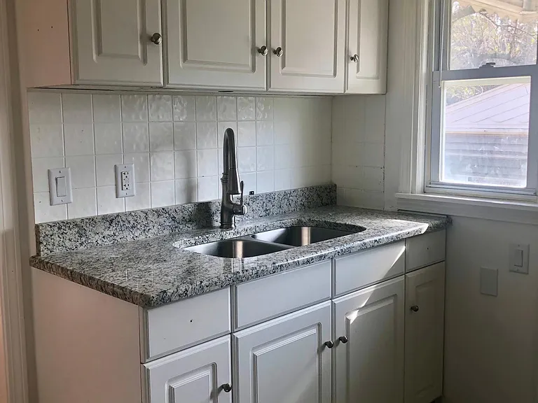 Kitchen--All white and gray