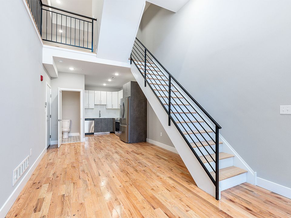 front door / kitchen/1/2 bathroom/living and dining area/ stairs / mezzanine