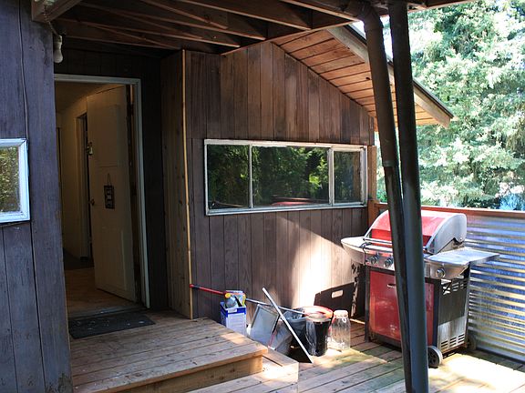 Side door from carport, deck
