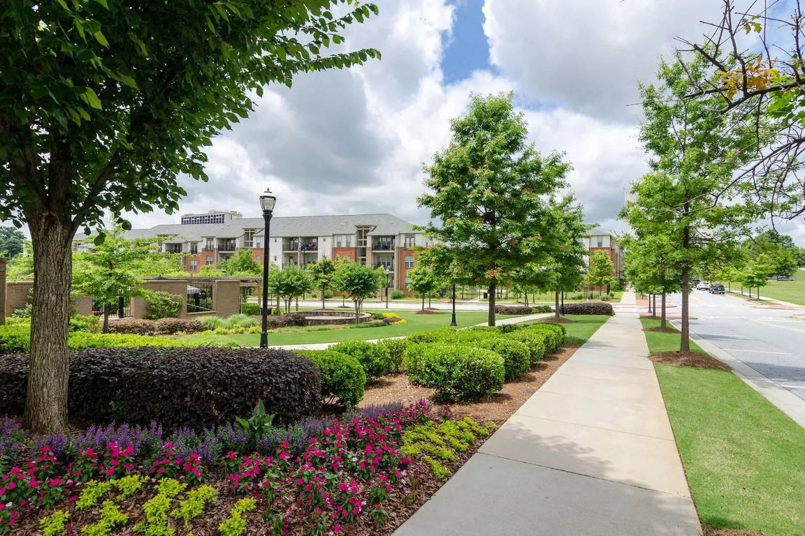 Beautifully manicured lawns invite you home