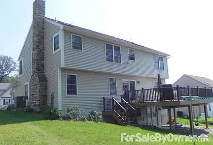 Deck and real fireplace/chimney
						:
						Under deck finished with river rock and dry-stack sandstone retaining wall. 