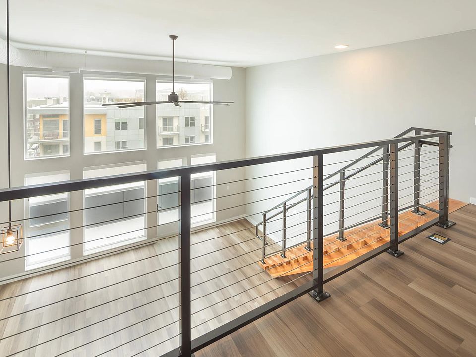 Enjoy floor-to-ceiling windows featured in our loft apartment homes.