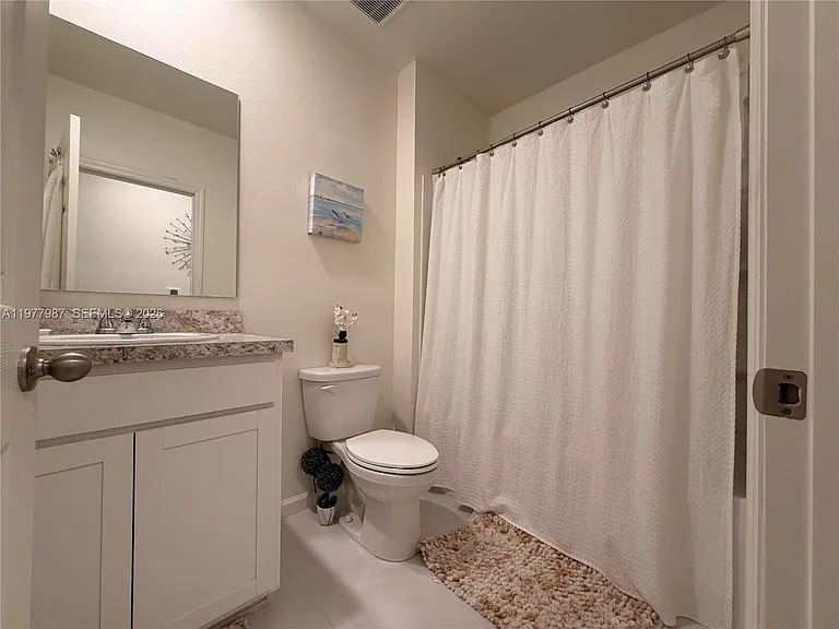 12422 SW Rimini Way — Photo 29