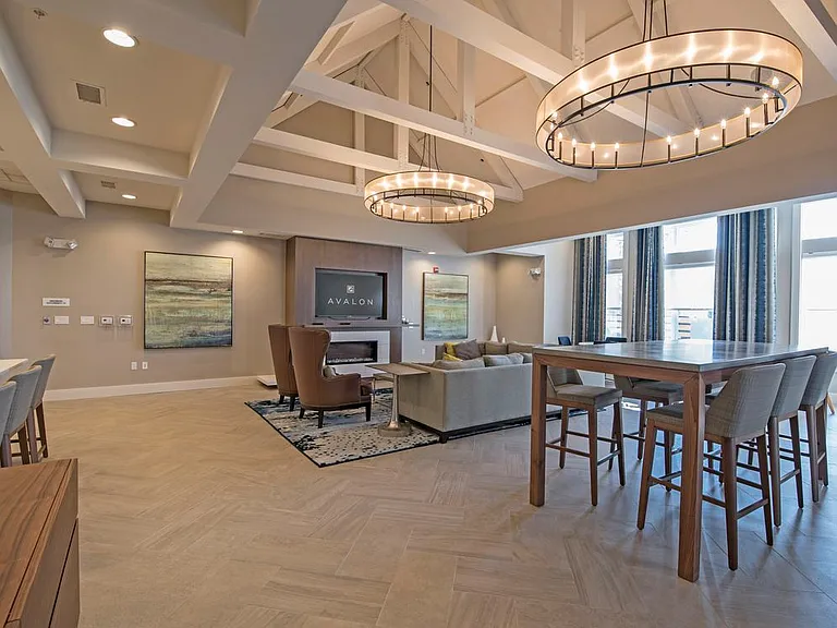 Lounge with fireplace and entertaining kitchen