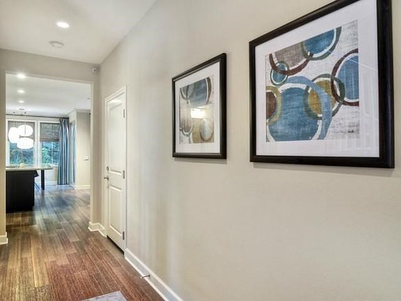 A Contemporary trend flows seamlessly throughout the home. This SMART home is wired on Automatic Light and Motion Sensors!