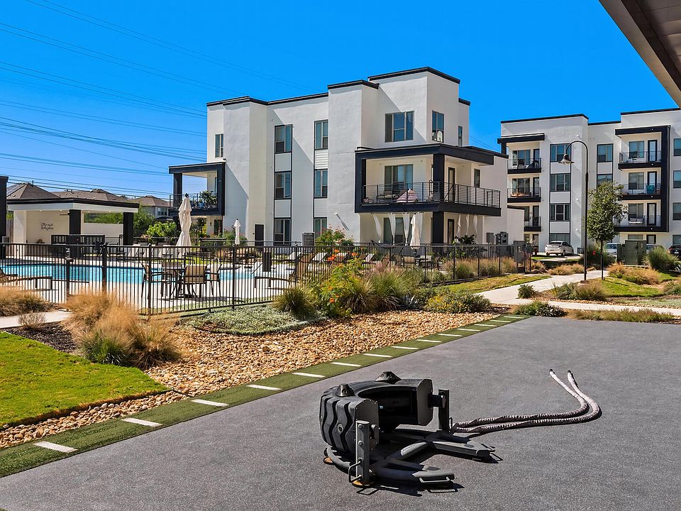 Modern Three-Story Apartment Buildings with Pool View at Rhythm Apartments