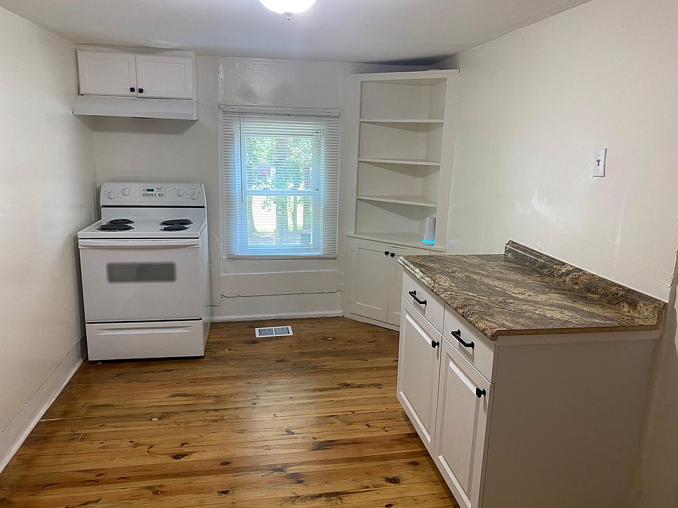 Built in shelving and ample storage