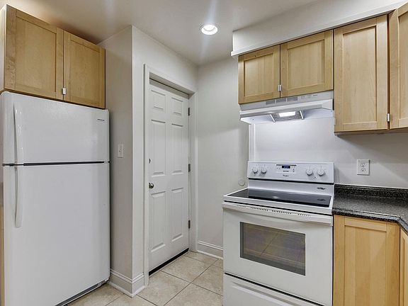 Glass top range with self cleaning range. Lots of cabinet space.