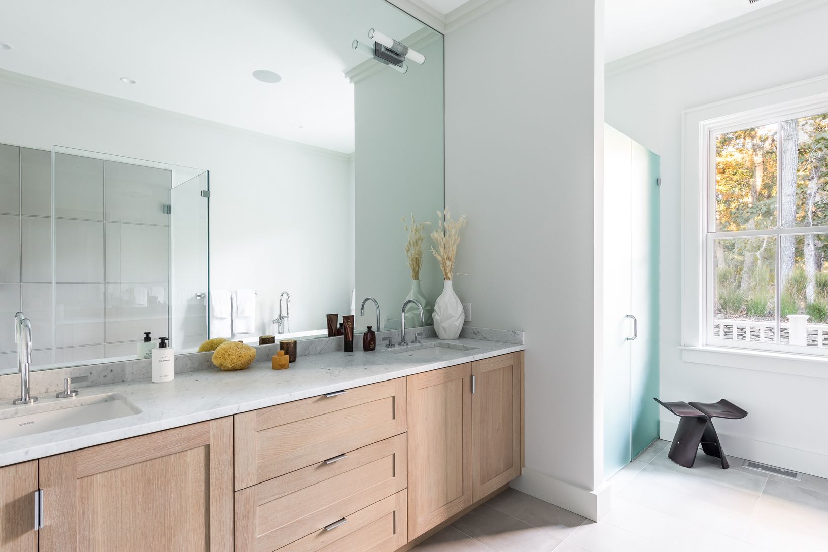  Master Bath 2 | Carrera Countertop with White Oak Cabinetry and Stainless Steel Pulls
