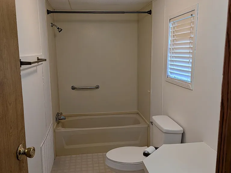 Primary bathroom as part of primary bedroom