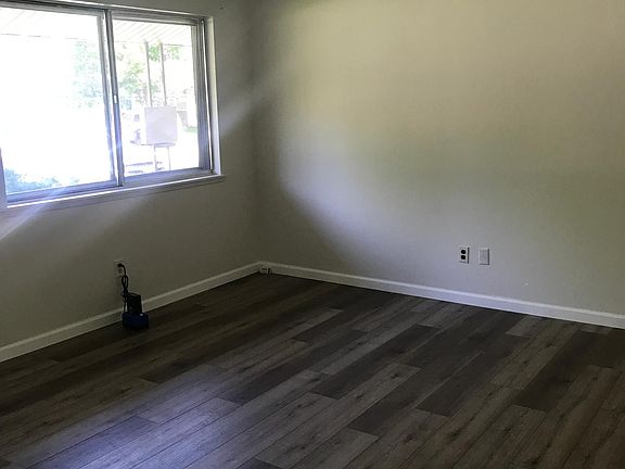 Bright family room, with large picture window