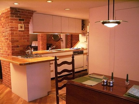 Lower-level includes galley kitchen for entertainment-ready