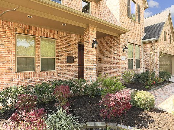 Updated landscaping is also well maintained adding to the homes curb appeal.