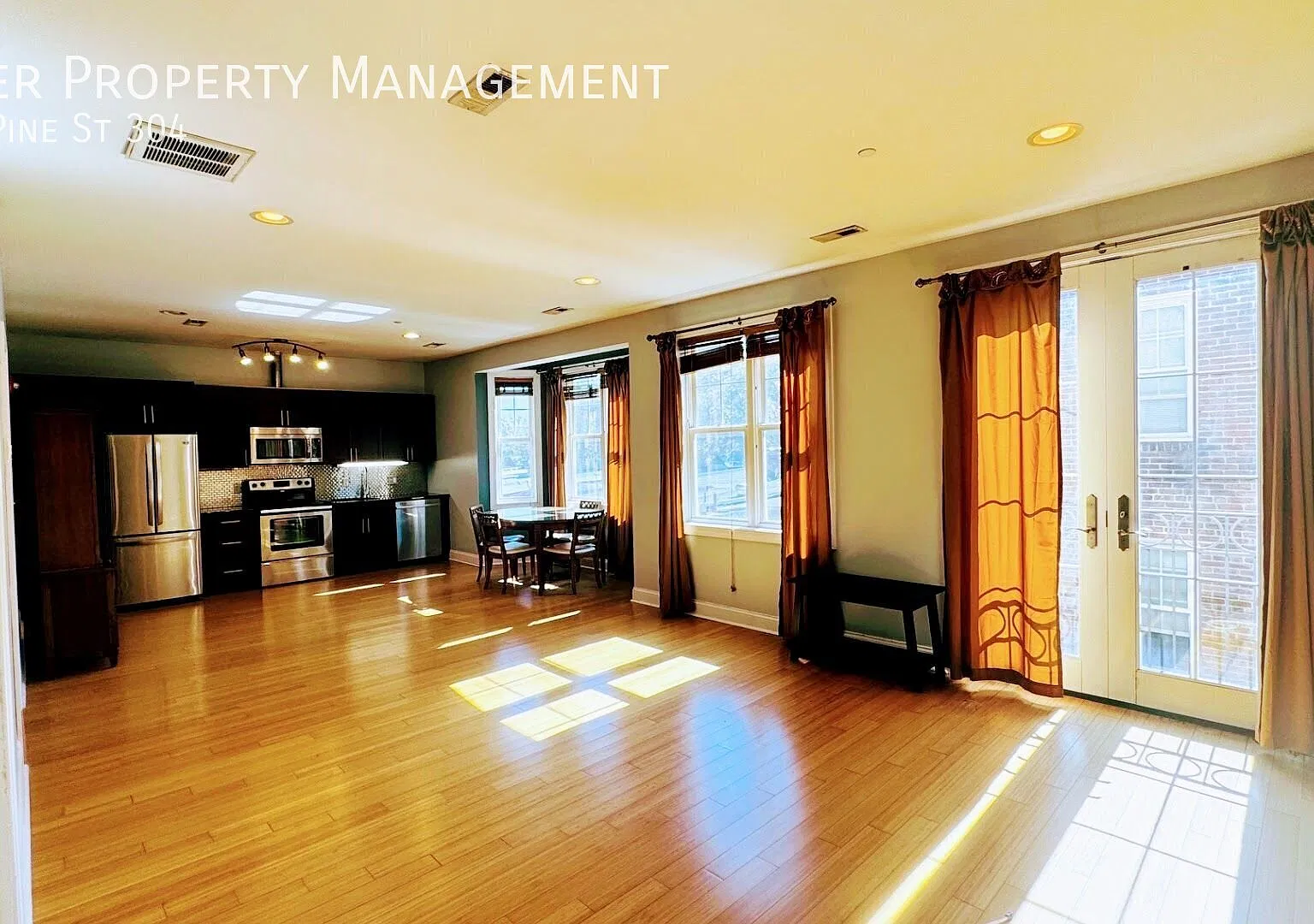Modern 1BR/1BA Condo with Garage Parking, Central A/C & In-Unit Laundry — Photo 3
