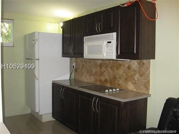 2nd image of 112 SW 7th Ter