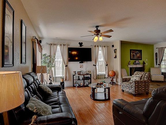 Family Room with Laminate floors and Home Theater Surround Pre-Wire.