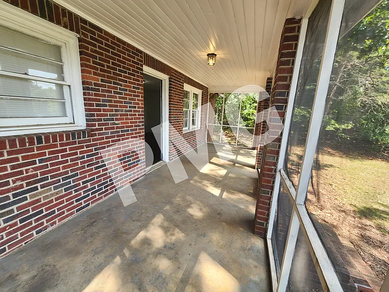 Screened-in front porch