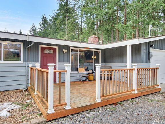 Newer front deck offers relaxing space for enjoying the outdoors