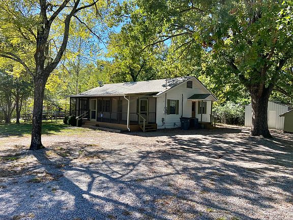 Front view from gravel parking area.