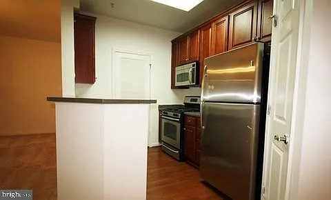 21216 McFadden Sq #207 — Photo 13