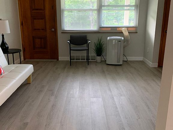 Living room with covered front porch