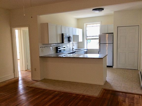 Apartment 1 kitchen. Granite countertops.