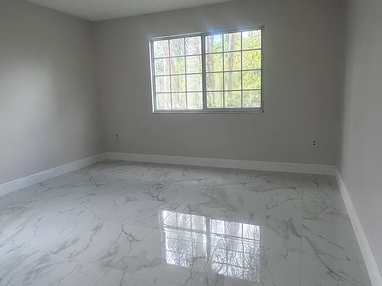 5011 Wiles Rd #207 — Photo 6