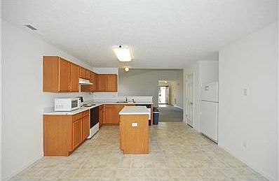Another view of Kitchen and Brkfst Room looking toward Great Room