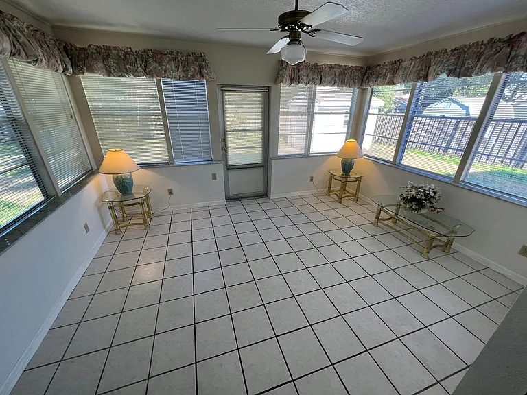 Large spacious, air-conditioned sunroom with real glass windows.