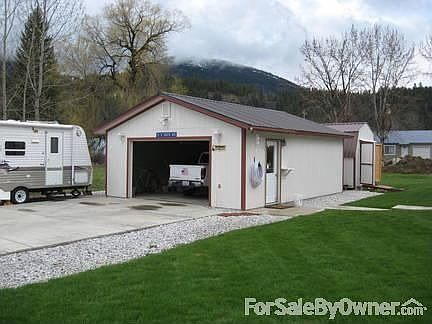 Insulated garage with drop ladder to attic Insulated storage shed