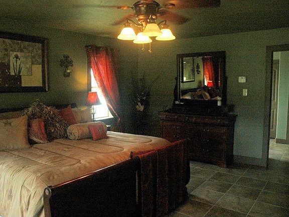 Huge master suite has room for sitting/office area.