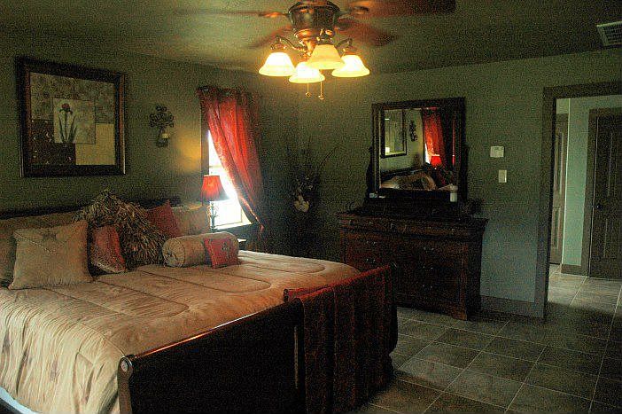 Huge master suite has room for sitting/office area.