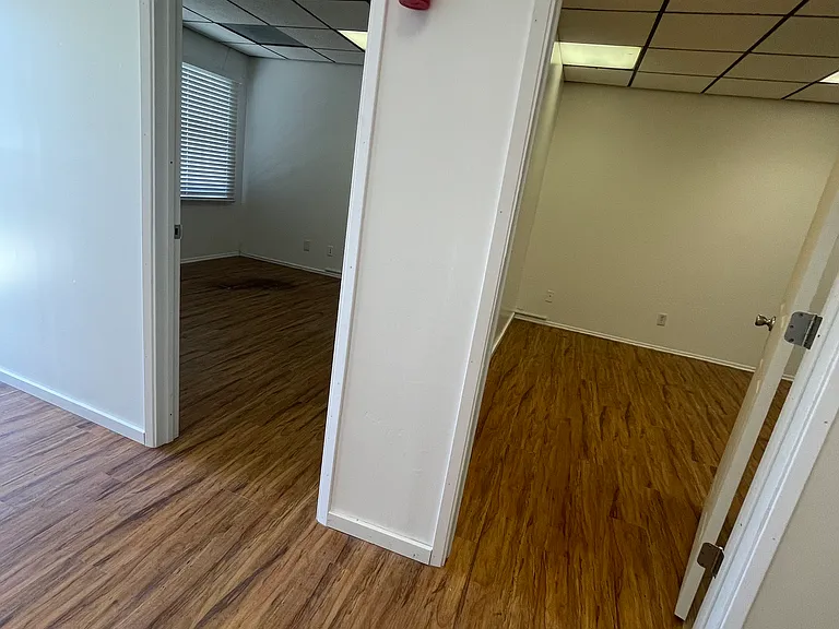 Hallway entry of two bedrooms. Master bedroom on right.