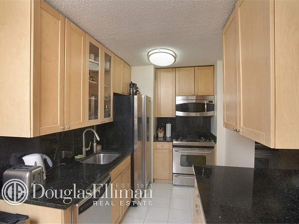 2nd image of 166 E 34th St APT 2E