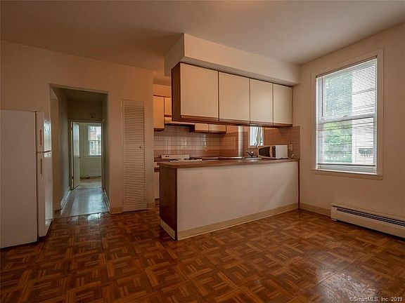 Open Kitchen and Hallway leading to Bedroom 2