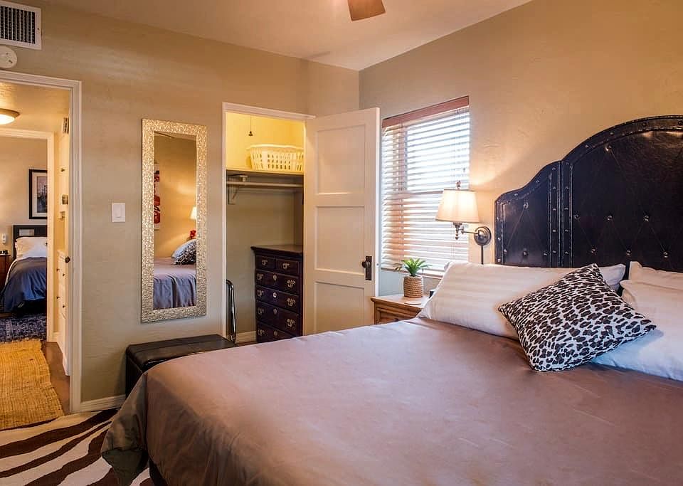 High ceilings in all rooms. Living room and bedroom ceiling fan with lights that have remote control.