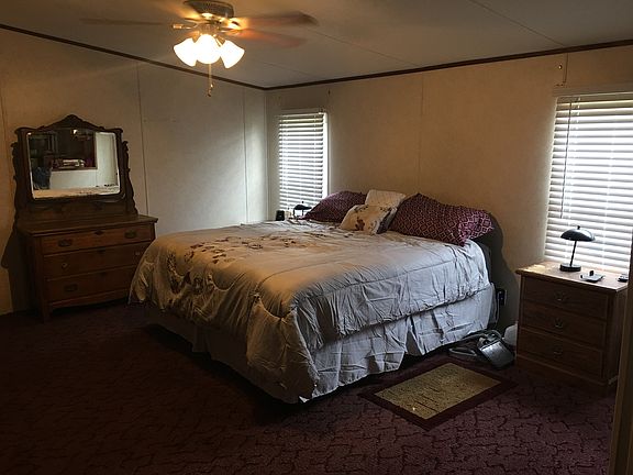 Master seen w/ king size bed