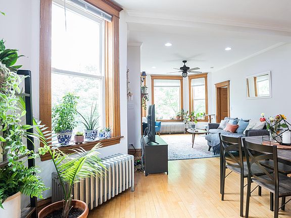 Beautiful sunny apartment, natural wood trim and wood floors throughout