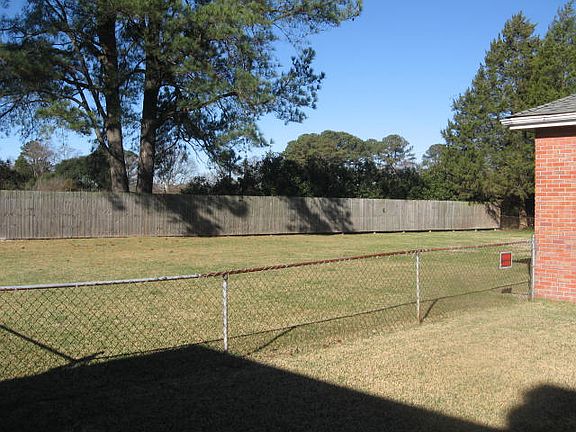 Large fenced back yard.