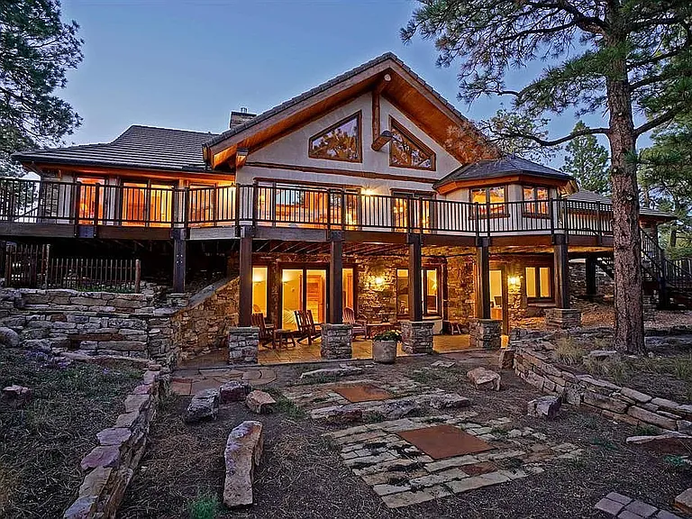 Rear of house with deck and downstairs patio