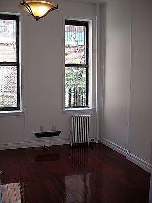 5th image of 607 E 11th St APT 4