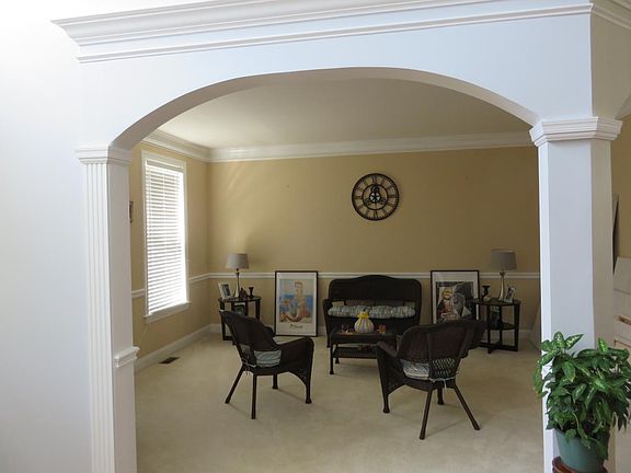 Living room with beautiful arched doorway entrance