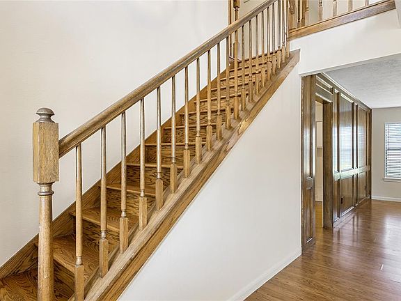 Pretty Staircase/ Laminated Wood Flooring/ Brand new Paint