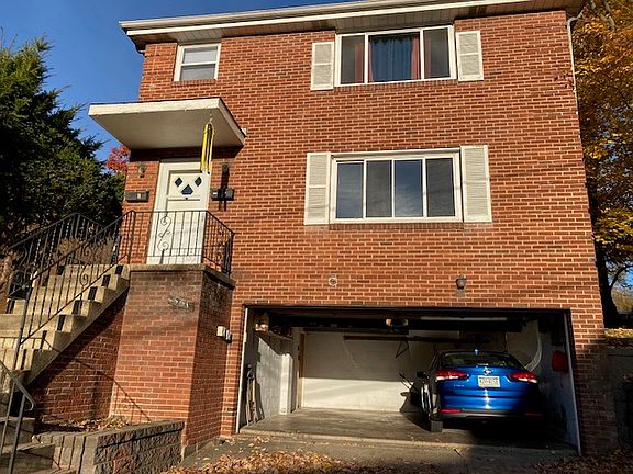 Exterior, 1st floor has shared garage.